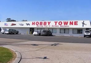 May be an image of text that says 'မာ 0-0 HOBy TOWNE TOW VNE Huving r is Serious Business'
