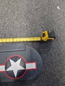 May be an image of measuring stick, skateboard and text