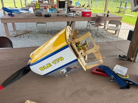 May be an image of helicopter and text