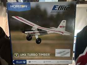 May be an image of aircraft and text that says 'HORIZON H BBH B B Efli ADVANCING ADVANCINGELECTRI ECTRI 2UMXTURBOTIMBER' LU UMX TURBO TIMBER 2 Ultra Micro STOL and Sport Airplane for Intermediate Pilots INCLUDED EASYTOFLY SYTOFLY NLN HIGH POWER FUNCTIONAL FUNCTIONALEXTRAS EXTRAS'