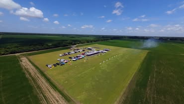 May be an image of silo and grass