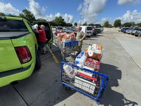 May be an image of golf cart, car and text