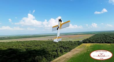 May be an image of windmill and text that says 'mang 意 BATON BATONROUGE ROUGE R R CLUB'