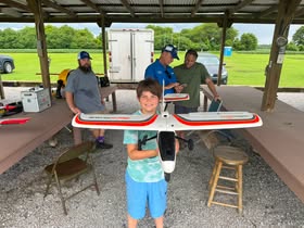 May be an image of kayak and text