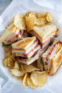 May be an image of club sandwich