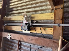 May be an image of water heater and text