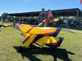 May be an image of seaplane, kayak and text